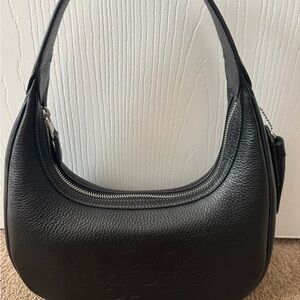 Coach Carmen black leather handbag.